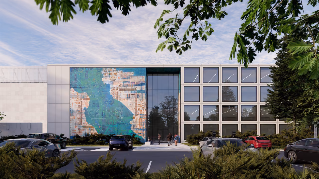Architectural rendering: a large square artwork in blue, green and copper tones on the façade of a pale building beside a tall glass entrance, with parked cars, shrubs and overhanging leaves in the foreground